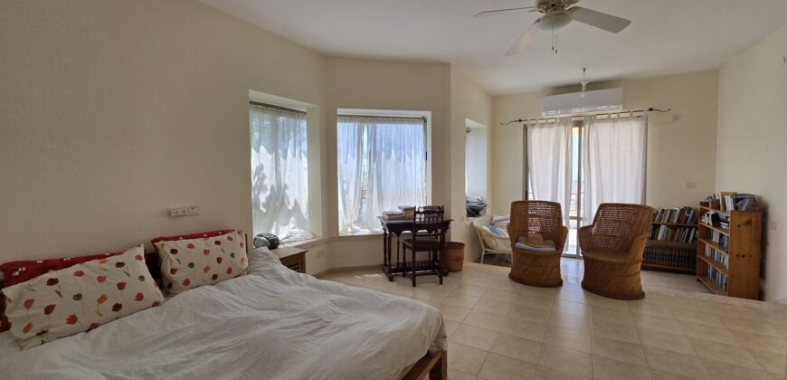 Semi-detached holiday villa with a pool and open view
